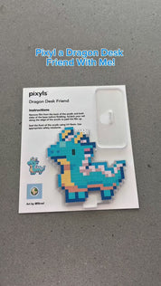 I think everyone needs a little dragon desk friend! It’s too cute 😆🩵

#pixyls #satisfyingvideo #stickerbynumber #stickerart #pixelart #pixelstickers #sticker #stickerart #crafting #craft #craftkit #dragon