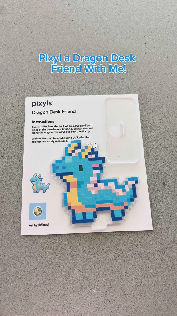 I think everyone needs a little dragon desk friend! It’s too cute 😆🩵 #pixyls #satisfyingvideo #stickerbynumber #stickerart #pixelart #pixelstickers #sticker #stickerart #crafting #craft #craftkit #dragon 